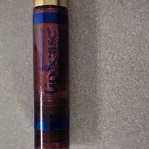 Senegence moisturizing lip gloss, red glitter in color, new in pkg